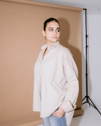 beige shirt