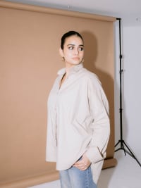 beige shirt