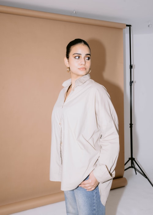 beige shirt